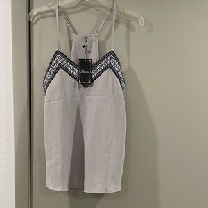 White and Black Tank Top with Geometric Trim